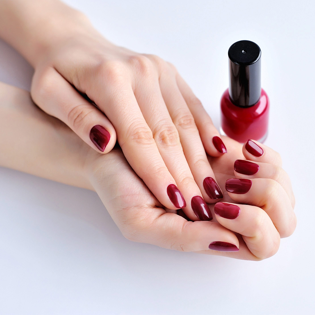 Inicio 8 hands of a woman with dark red manicure and nail p 2021 08 26 18 28 16 utc